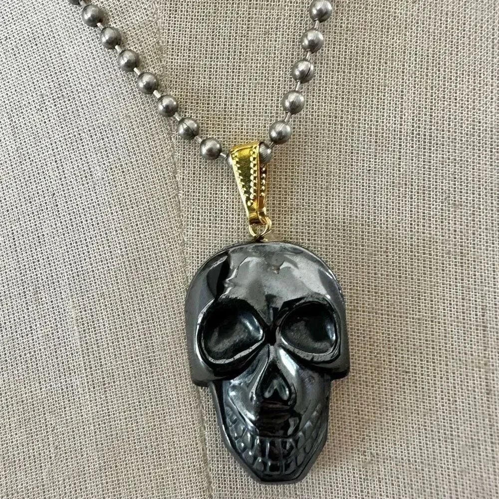 Hematite skull pendant necklace
